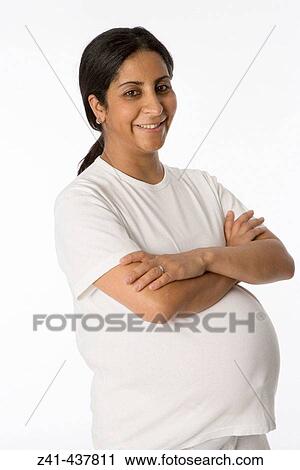 Pregnant woman looking into the camera View Large Photo Image Stock Image - Pregnant woman looking into the camera. Fotosearch