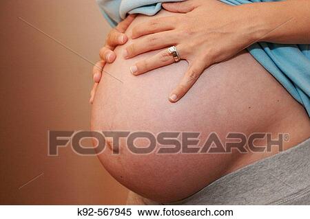Pregnant woman - nine months View Large Photo Image Stock Photography - Pregnant woman - nine months. Fotosearch