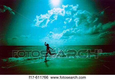 Pregnant woman on the beach View Large Photo Image Stock Photograph - Pregnant woman on the beach. Fotosearch
