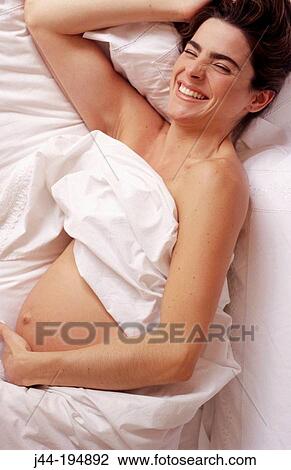 Stock Image - Pregnant woman. Fotosearch