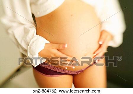 Stock Image - Pregnant woman. Fotosearch