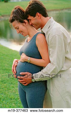 pregnant woman with affectionate husband View Large Photo Image Stock Image - pregnant woman with affectionate husband. Fotosearch