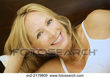 Stock Photo - Pregnant woman with glowing smile.. Fotosearch
