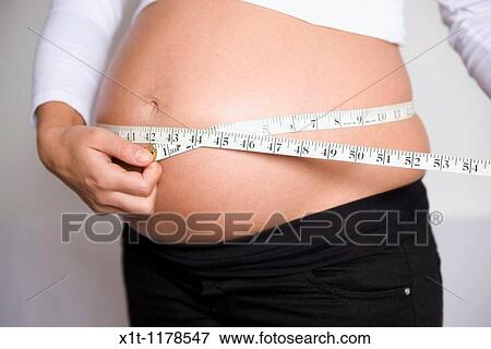 Stock Photo - Pregnant women.. Fotosearch