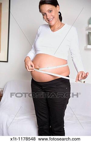 Stock Photo - Pregnant women.. Fotosearch