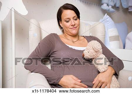 Pregnant women with Stuffed Animals. View Large Photo Image Picture - Pregnant women with Stuffed Animals.. Fotosearch