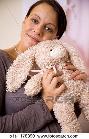 Pregnant women with Stuffed Animals. View Large Photo Image Stock Image - Pregnant women with Stuffed Animals.. Fotosearch