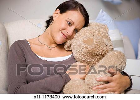Pregnant women with Stuffed Animals. View Large Photo Image Stock Image - Pregnant women with Stuffed Animals.. Fotosearch