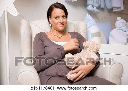 Pregnant women with Stuffed Animals. View Large Photo Image Stock Image - Pregnant women with Stuffed Animals.. Fotosearch