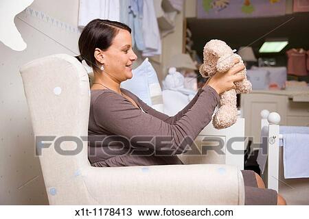 Pregnant women with Stuffed Animals. View Large Photo Image Stock Image - Pregnant women with Stuffed Animals.. Fotosearch