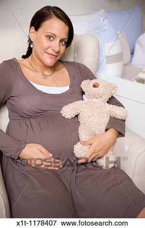 Pregnant women with Stuffed Animals. View Large Photo Image Stock Photo - Pregnant women with Stuffed Animals.. Fotosearch