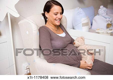 Pregnant women with Stuffed Animals. View Large Photo Image Stock Photo - Pregnant women with Stuffed Animals.. Fotosearch