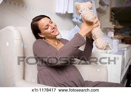 Pregnant women with Stuffed Animals. View Large Photo Image Stock Photo - Pregnant women with Stuffed Animals.. Fotosearch
