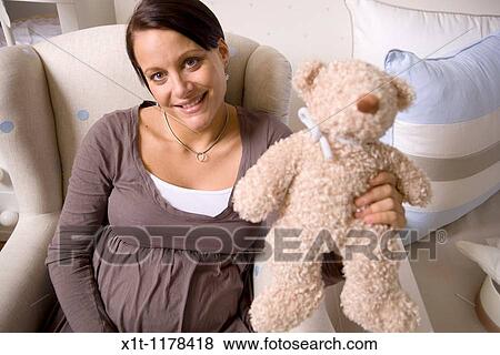 Pregnant women with Stuffed Animals. View Large Photo Image Stock Photo - Pregnant women with Stuffed Animals.. Fotosearch