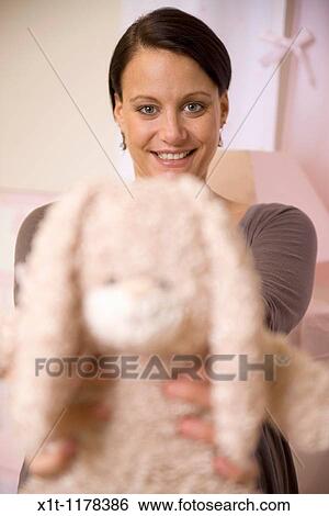 Pregnant women with Stuffed Animals. View Large Photo Image Stock Photograph - Pregnant women with Stuffed Animals.. Fotosearch