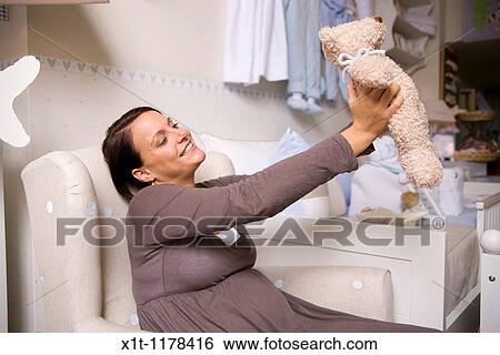 Pregnant women with Stuffed Animals. View Large Photo Image Stock Photograph - Pregnant women with Stuffed Animals.. Fotosearch