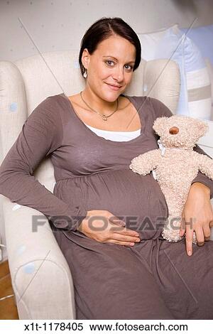 Pregnant women with Stuffed Animals. View Large Photo Image Stock Photography - Pregnant women with Stuffed Animals.. Fotosearch