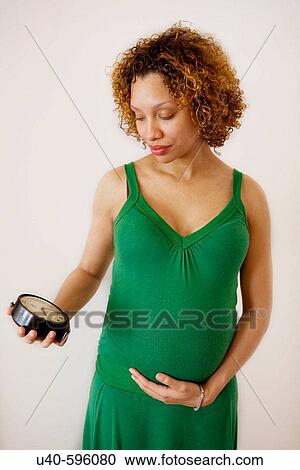 Pregnant young woman View Large Photo Image Stock Image - Pregnant young woman. Fotosearch