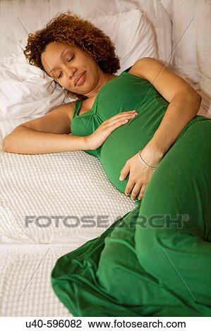 Pregnant young woman View Large Photo Image Stock Image - Pregnant young woman. Fotosearch
