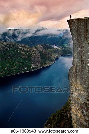 Stock Image - Preikestolen, Pulpit Rock, 600 meters over LyseFjord, Lyse Fjord, in Ryfylke district, Rogaland Region, It is the most popular hike in Stavanger area, Norway.. Fotosearch