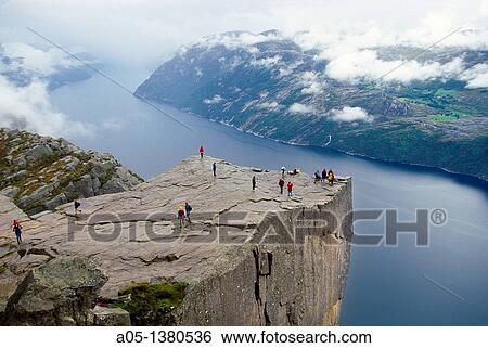 Preikestolen, Pulpit Rock, 600 meters over LyseFjord, Lyse Fjord, in Ryfylke district, Rogaland Region, It is the most popular hike in Stavanger area, Norway. View Large Photo Image Stock Photograph - Preikestolen, Pulpit Rock, 600 meters over LyseFjord, Lyse Fjord, in Ryfylke district, Rogaland Region, It is the most popular hike in Stavanger area, Norway.. Fotosearch
