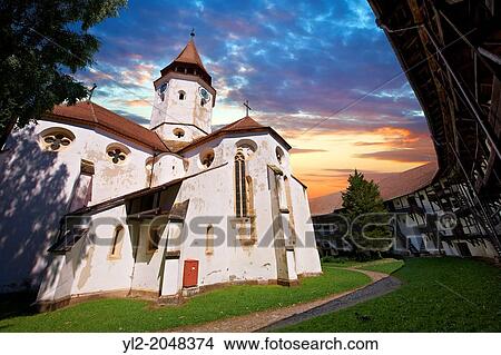 Prejmer ( German: Tartlau) Fortified Church, one of the best preserved of its kind in Eastern Europe was built by the Teutonic Knights in 12 12. Brasov, Transylvania. UNESCO World Heritage Site. View Large Photo Image Picture - Prejmer ( German: Tartlau) Fortified Church, one of the best preserved of its kind in Eastern Europe was built by the Teutonic Knights in 12 12. Brasov, Transylvania. UNESCO World Heritage Site.. Fotosearch