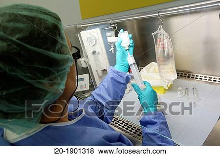 Preparation of cytostatic, Chemotherapy, Pharmacy, Onkologikoa Hospital, Oncology Institute, Case Center for prevention, diagnosis and treatment of cancer, Donostia, San Sebastian, Gipuzkoa, Basque Country, Spain View Large Photo Image Stock Photo - Preparation of cytostatic, Chemotherapy, Pharmacy, Onkologikoa Hospital, Oncology Institute, Case Center for prevention, diagnosis and treatment of cancer, Donostia, San Sebastian, Gipuzkoa, Basque Country, Spain. Fotosearch