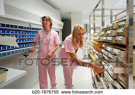 Stock Image - Preparation of drugs, Chaotic storage, Pharmacy, Hospital Donostia, San Sebastian, Gipuzkoa, Basque Country, Spain. Fotosearch