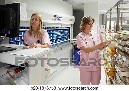 Stock Image - Preparation of drugs, Chaotic storage, Pharmacy, Hospital Donostia, San Sebastian, Gipuzkoa, Basque Country, Spain. Fotosearch