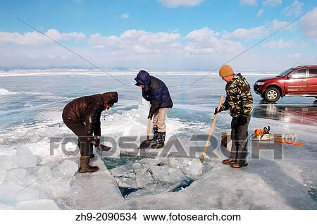 Preparations for ice-diving, in Lake Baikal, Olkhon island, Siberia, Russia, Eurasia. View Large Photo Image Picture - Preparations for ice-diving, in Lake Baikal, Olkhon island, Siberia, Russia, Eurasia.. Fotosearch