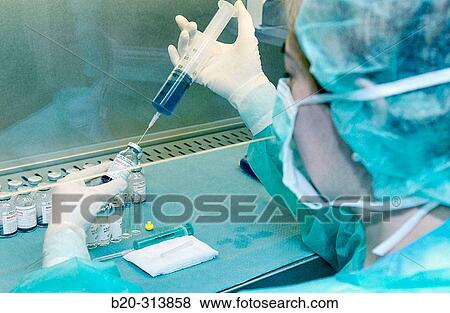 Preparing antibiotic at chemist of hospital View Large Photo Image Stock Photo - Preparing antibiotic at chemist of hospital. Fotosearch