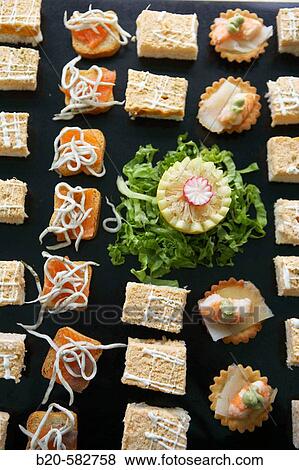 Preparing canap? s. Wedding. Divinus Catering, San Sebastian, Donostia, Gipuzkoa, Euskadi. Spain. View Large Photo Image Stock Photo - Preparing canap? s. Wedding. Divinus Catering, San Sebastian, Donostia, Gipuzkoa, Euskadi. Spain.. Fotosearch