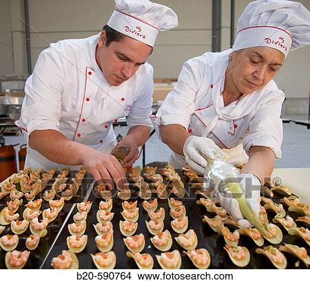 Preparing canapes (snack with prawn, salmon, potato and avocado), Divinus Catering, San Sebastian, Donostia, Gipuzkoa, Basque Country View Large Photo Image Picture - Preparing canapes (snack with prawn, salmon, potato and avocado), Divinus Catering, San Sebastian, Donostia, Gipuzkoa, Basque Country. Fotosearch