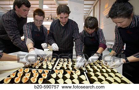 Preparing canapes (snack with prawn, salmon, potato and avocado), Divinus Catering, San Sebastian, Donostia, Gipuzkoa, Basque Country View Large Photo Image Stock Photo - Preparing canapes (snack with prawn, salmon, potato and avocado), Divinus Catering, San Sebastian, Donostia, Gipuzkoa, Basque Country. Fotosearch