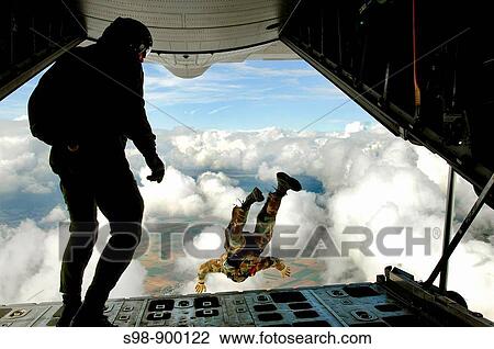 Preparing for an upcoming mission, pararescuemen jump out the back of a C-130 Hercules during jump training Sept 24 over southwestern Germany They are with the 786th Security Forces Squadron View Large Photo Image Stock Image - Preparing for an upcoming mission, pararescuemen jump out the back of a C-130 Hercules during jump training Sept 24 over southwestern Germany They are with the 786th Security Forces Squadron. Fotosearch