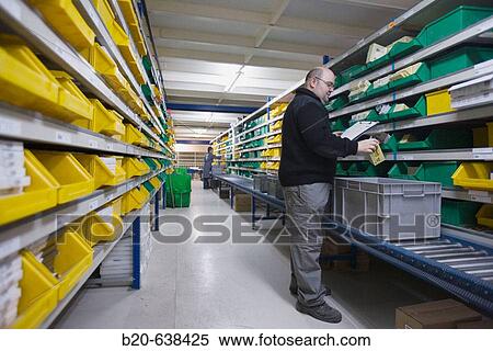 Preparing order, office supplies at store house. Guipuzcoa, Euskadi, Spain View Large Photo Image Stock Photography - Preparing order, office supplies at store house. Guipuzcoa, Euskadi, Spain. Fotosearch