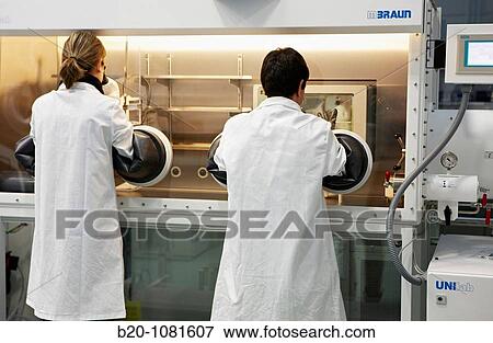 Stock Photo - Preparing samples in inert atmosphere, controlled atmosphere glove box, stereo microscope, Synthesis Laboratory, CIC nanoGUNE Nanoscience Cooperative Research Center, Donostia, Gipuzkoa, Euskadi, Spain. Fotosearch