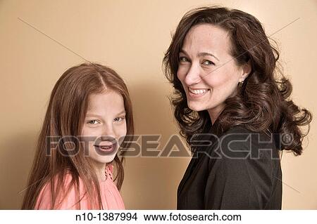 Preteen girl and her mother View Large Photo Image Picture - Preteen girl and her mother. Fotosearch