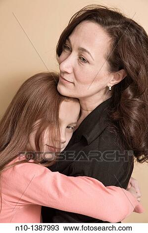 Preteen girl and her mother View Large Photo Image Stock Image - Preteen girl and her mother. Fotosearch