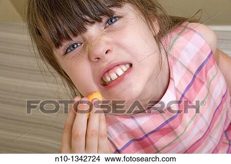 Preteen girl eating peaches View Large Photo Image Picture - Preteen girl eating peaches. Fotosearch