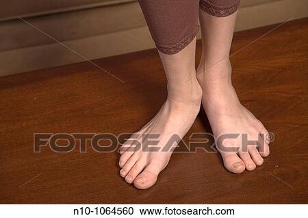 Stock Image - Preteen girl's feet. Fotosearch