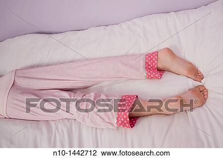 Preteen girl's legs and feet View Large Photo Image Stock Image - Preteen girl's legs and feet. Fotosearch