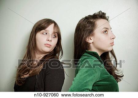 Preteen sisters posing View Large Photo Image Stock Image - Preteen sisters posing. Fotosearch