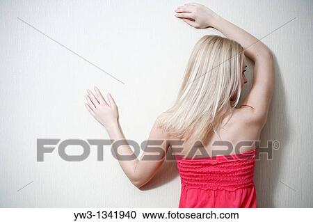 pretty blond girl in red wear indoors View Large Photo Image Stock Image - pretty blond girl in red wear indoors. Fotosearch