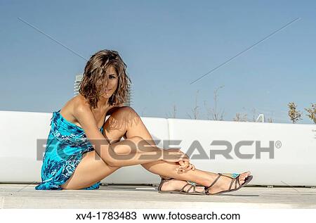 Pretty Brunette seated at Ebro riverside at ExpoZaragoza outdoors area, Saragossa, Aragon, Spain View Large Photo Image Stock Image - Pretty Brunette seated at Ebro riverside at ExpoZaragoza outdoors area, Saragossa, Aragon, Spain. Fotosearch