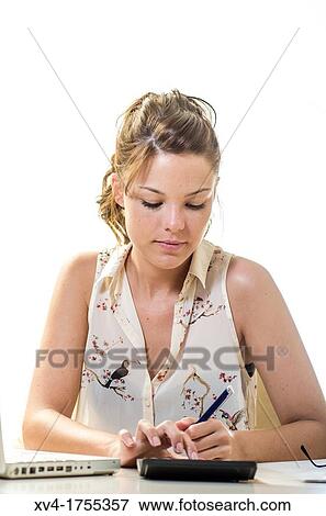 Pretty girl making homework View Large Photo Image Stock Photo - Pretty girl making homework. Fotosearch