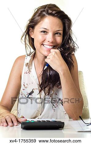 Stock Photo - Pretty girl making homework. Fotosearch