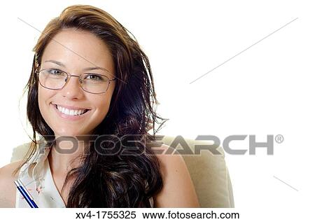 Stock Photography - Pretty girl making homework. Fotosearch