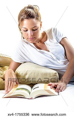 Pretty girl reading book in the bedroom View Large Photo Image Stock Photograph - Pretty girl reading book in the bedroom. Fotosearch