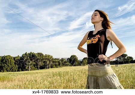 Pretty girl relaxing and enjoy in the wheat field View Large Photo Image Stock Image - Pretty girl relaxing and enjoy in the wheat field. Fotosearch